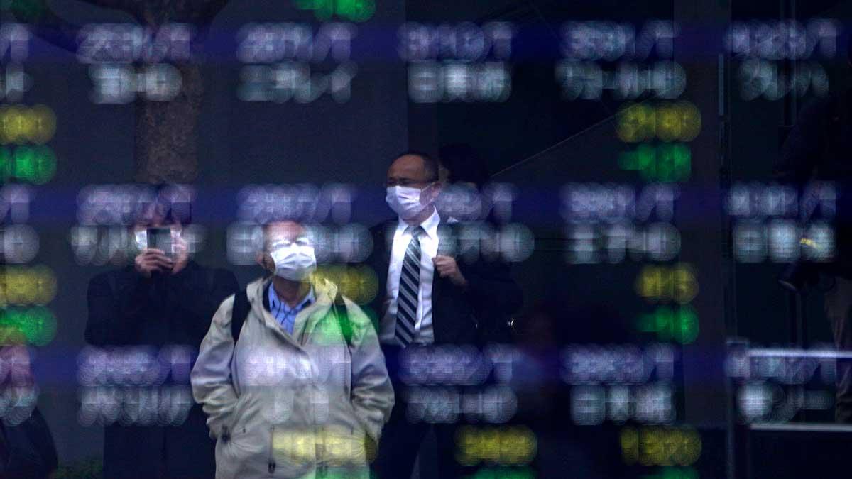 Nikkei i Japan står på plus tidigt på fredagsmorgonen, svensk tid, men överlag påverkas börshandeln i Asien av bland annat nya virusutbrott. (Foto: TT)
